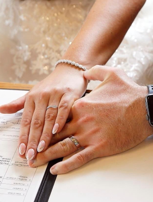 Bride and groom hands